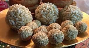 The Culture of Nepal: A Brief Introduction 4 Sankranti Delights: A mosaic of laddus celebrating the festival's warmth and sweetness.