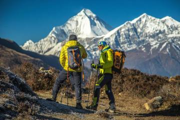 climbers stopping on trail in mountains